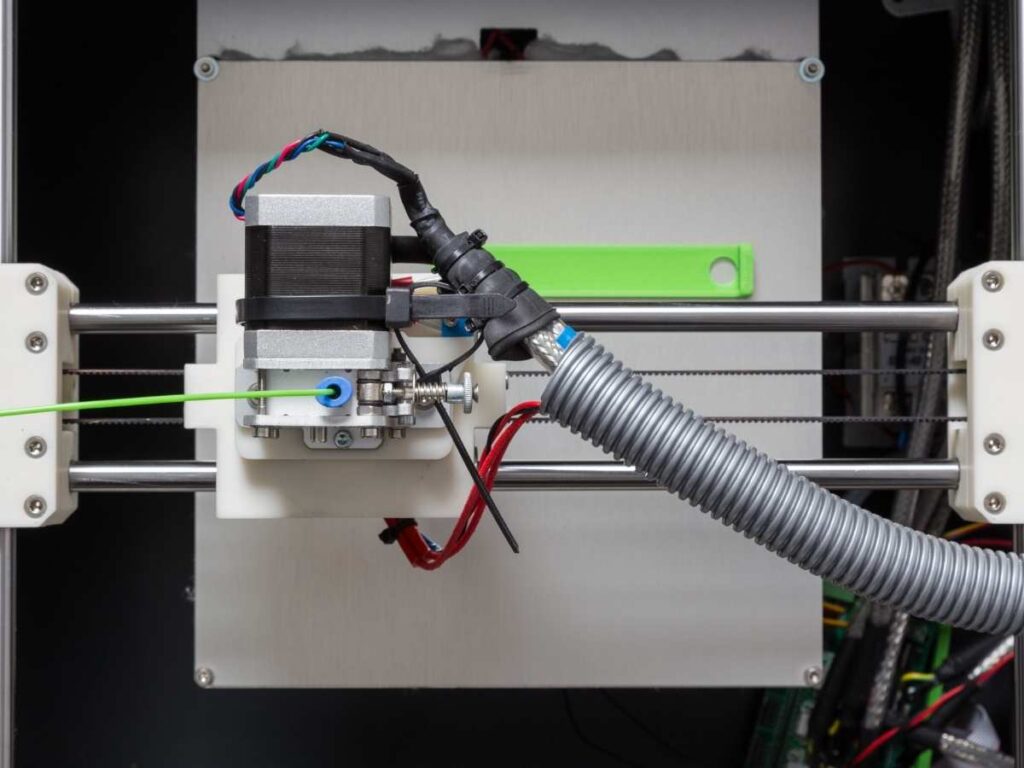 3d printer with heated bed and green filament