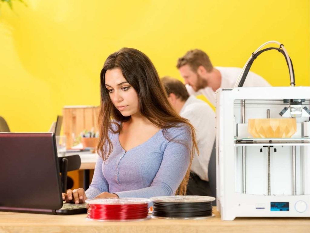 girl checking why 3d printer is skipping layers