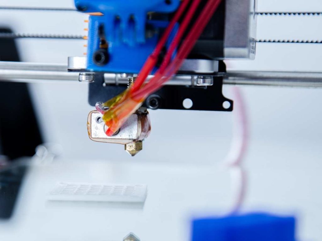 3d printer with a close up of a 3d printer nozzle