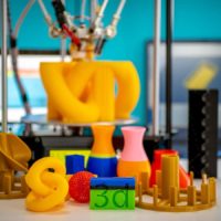 3d printed objects sitting on a 3d printer