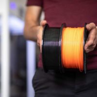 3d printer filament nicely rolled and tangled up spool