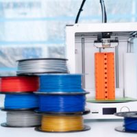 3d printer with a big stack of filament spools