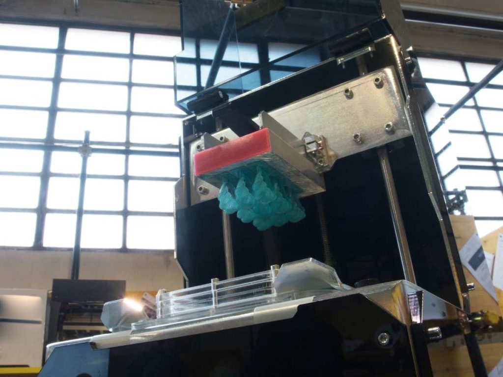 sla 3d resin printer standing near the window for ventilation