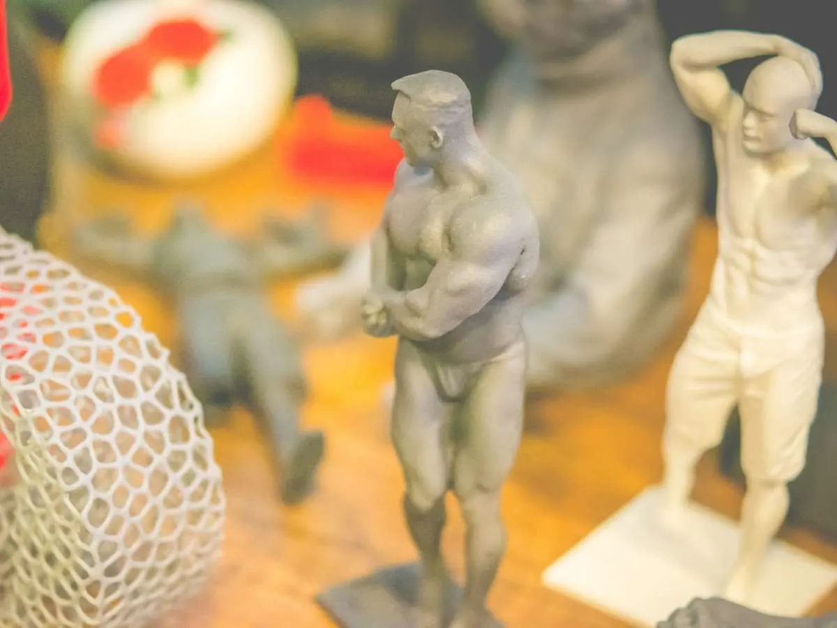 resin 3d printed objects resistant to heat grey and white bodybuilder