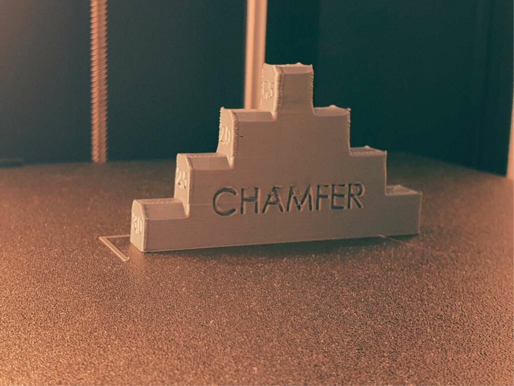 3d printed object with test chamfers and fillets