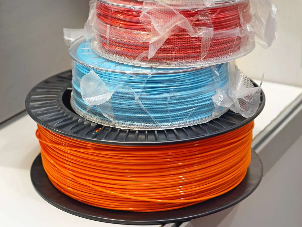 3d printer filament spools and 1 sealed in plastic bag